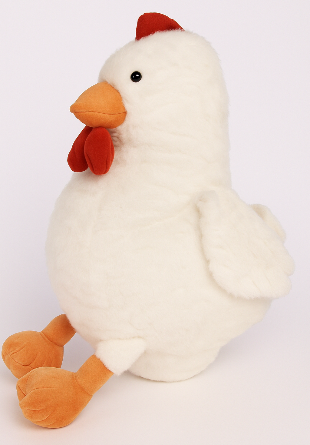 Plush toy chicken with a white body, orange feet and beak, and red comb on a light gray background.